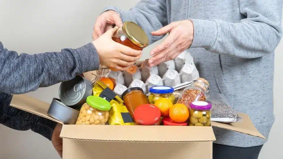 A food bank providing free groceries to families in need to reduce living expenses and support low-income individuals in managing their finances.