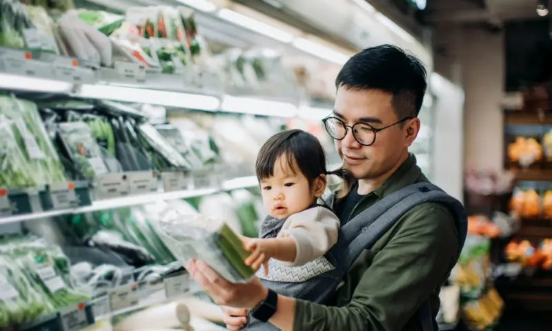 Family enjoying a budget-friendly shopping trip when you spend money wisely